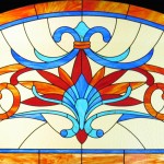 Vetrata in vetro cattedrale e colorescente legato in piombo, cm. 180x110
